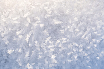 A structure of ice crystals with a color gradient that can be used as a background