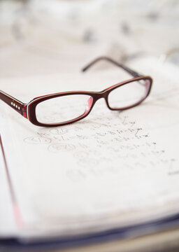 Close-up of Eyeglasses on Math Homework
