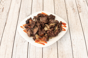 Liver with onions is a traditional dish of many cuisines