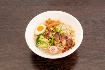 Japan has its own recipe for ramen, the basic preparation consists of different types of Japanese noodles served in a broth prepared usually based on pork or chicken bone and different vegetables