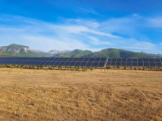 Installation and assembly of solar farms, photovoltaic panels, renewable energy, mountains