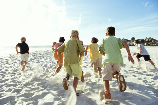 Children Running on Beach