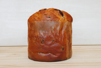 Panettone on a wooden background