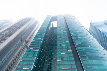 Fototapeta na wymiar skyscraper building with glass facade architecture in perspective. skyscraper architecture