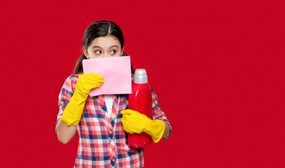 girl with softener detergent isolated on red, advertisement. girl with softener detergent