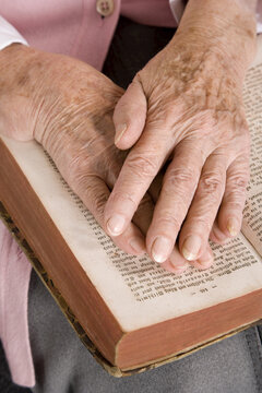 Woman's Hands on Book