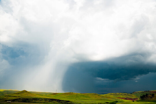 Big Clouds Over Field, Wyoming, USA