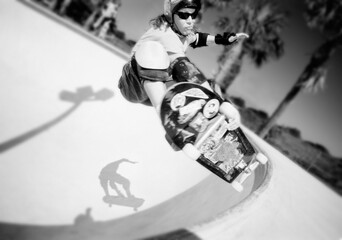 Man Skateboarding in Skatepark