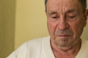 Senior man with a serious look on his face