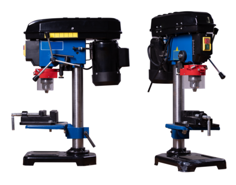 Bench drill for making holes in various materials. Isolated background.