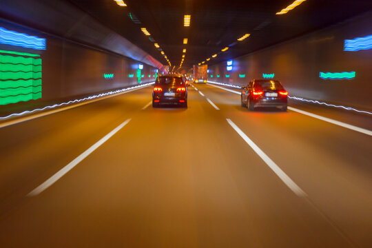 Cars Driving in Tunnel at Night, Germany