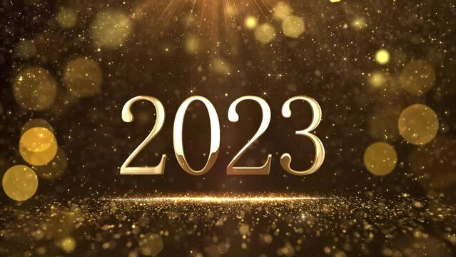 2023 New Year glittering gold bright text. New Year's Eve with glittering gold particles and snow.  Merry Christmas - Holiday Stock Video