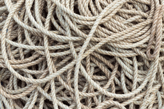 Close-up of a pile of rope in the harbor at Seahouses in Northumberland, England, United Kingdom