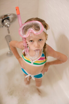 Girl with Snorkel in Bathtub