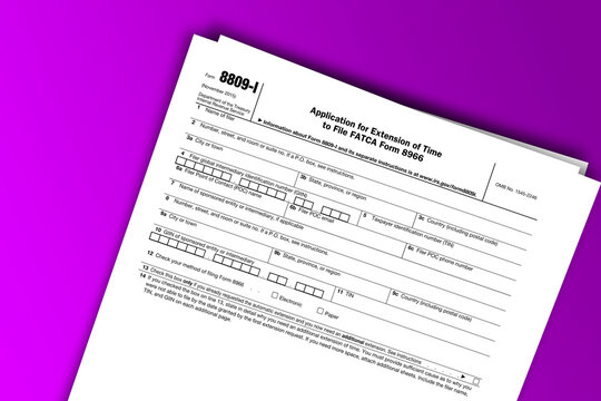 Form 8809-I documentation published IRS USA 11.17.2015. American tax document on colored