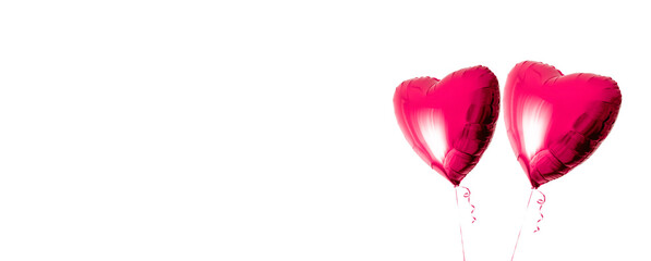 Two beautiful red heart shaped balloons with ribbon isolated on a white background. Valentines day. Love symbol. Birthday party. Festive business card. Gift certificate. Greeting card. Mockup design