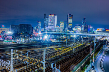Fototapeta na wymiar 【愛知県】名古屋駅方面のビル群とささしまライブ駅周辺の夜景