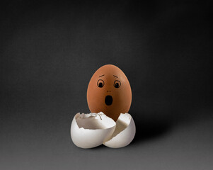Broken egg, shocked egg. Creative concept photography