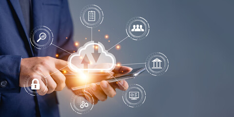 Businessman uses a smartphone with cloud computing diagram shown up a hand. Cloud technology. Networking and internet service concept. Cloud storage and working through digital with modern technology