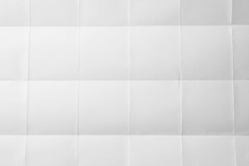 Blank sheet of paper with creases as background, closeup