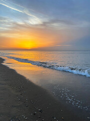 Beautiful view of sandy beach at sunrise