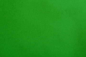 Textured bright green background. Chroma key compositing