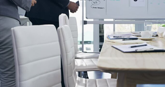 Business people, boardroom and team preparation for meeting, conference or business discussion at office. Group of corporate employee workers getting ready or setting up room for training workshop