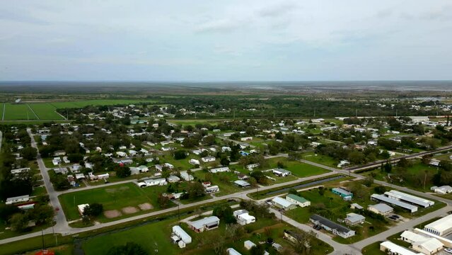 Aerial approach residential real estate homes in Moore Haven Florida