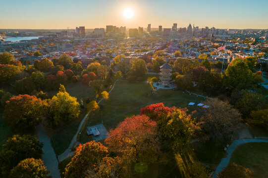 Aerial Drone View of Patterson Park in Baltimore City in Fall at Sunset with the City Skyline in the Distance