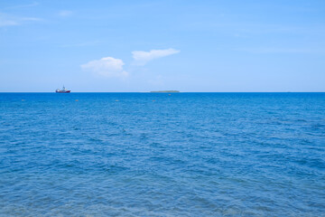 sunny day at Bangsring Beach Banyuwangi, floating house in the ocean, blue sky and sea, sea and sky, boat in the sea, beach and sea