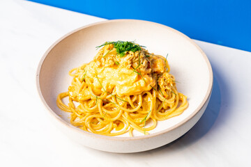spaghetti with spicy crab curry in Thai style