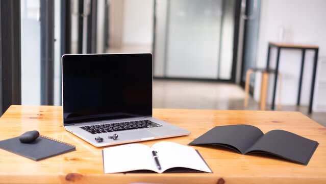 Blank Screen Digital Tablet On Wooden Table, Vertical View. Mockup Creative Workspace With Digital Tablet.