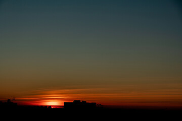 sunset over city, urban landscape