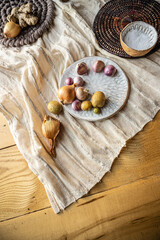 flatlay food photo of colorful fresh salad on yellow and white textile mat