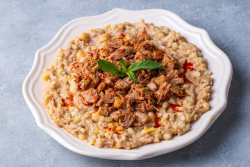 Traditional turkish food, made of meat and wheat, delicious ramadan food (Turkish name; Keskek)