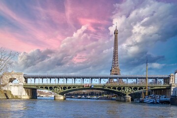 Paris, the Bir-Hakeim bridge on the Seine, with the Eiffel Tower at sunset
