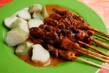 Indonesia chicken satay with rice cakes