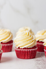 Group of red velvet cupcakes on white background 