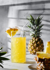 pineapple juice on a gray background