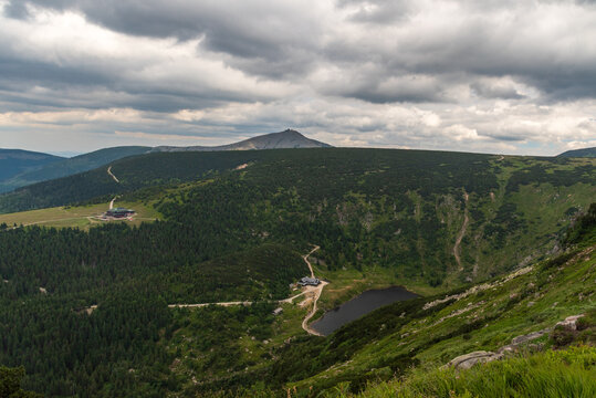 Maly Staw with Schronisko Samotnia hut, Strzecha Akademicka hut and Sniezka hill in Karkonosze mountains