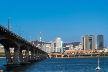 Seoul cityscapes, skyline, high rise office buildings and skyscrapers with blue sky and cloud in Seoul city, winter daylight, top view in winter, Seoul, Republic of Korea,