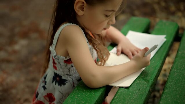 little girl drawing picture .