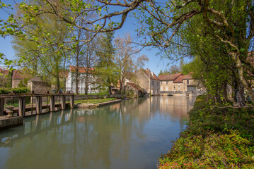 Fototapeta na wymiar A canal in the small town of Donzy, Burgundy, France