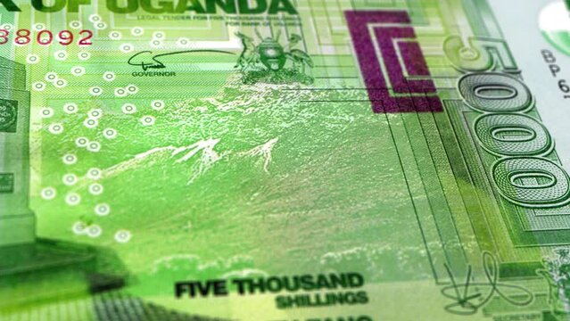 Uganda Ugandan Shilling 5000 Banknotes, Five Thousand Ugandan Shilling, Close-up and macro view of the Ugandan Shilling, Tracking and Dolly Shots 5000 Ugandan Shilling banknote Observe and Reserve