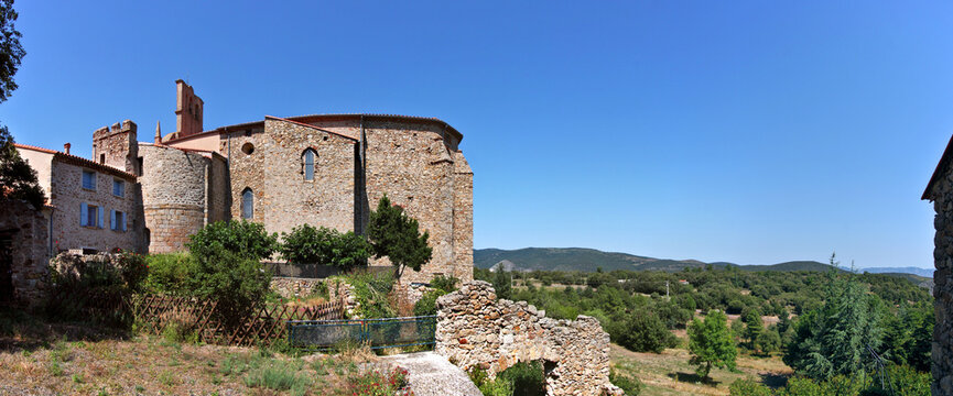 Panoramic view of the medieval St Etienne village church in Campoussy, Occitanie region in France
