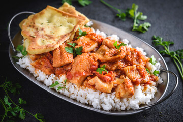 Delicious fish curry with naan bread
