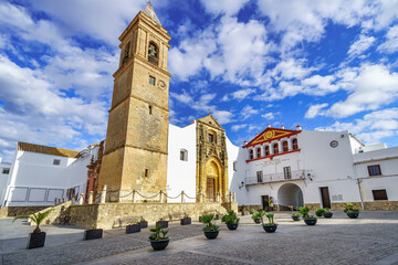 Fototapeta na wymiar Main square with medieval church of the picturesque village of Alcala de los Gazules, Cadiz, Spain.