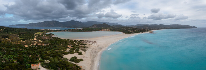 aerial panorama of Capo Carbonara and the beach and lake near Villasimius in southeastern Sardinia