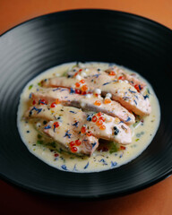 fish with cream sauce and caviar
