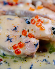 fish with cream sauce and caviar